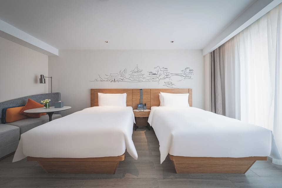 Deluxe Twin Room, 1 Bedroom | Down comforters, memory foam beds, minibar (free items), in-room safe