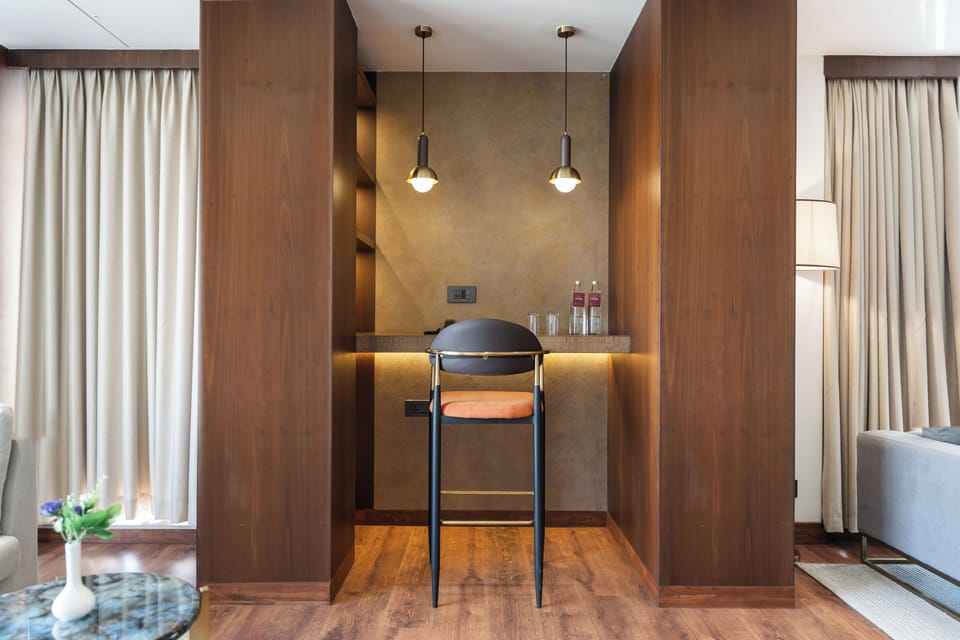 Luxury Suite | Living area | 52-inch LED TV with satellite channels, TV, fireplace