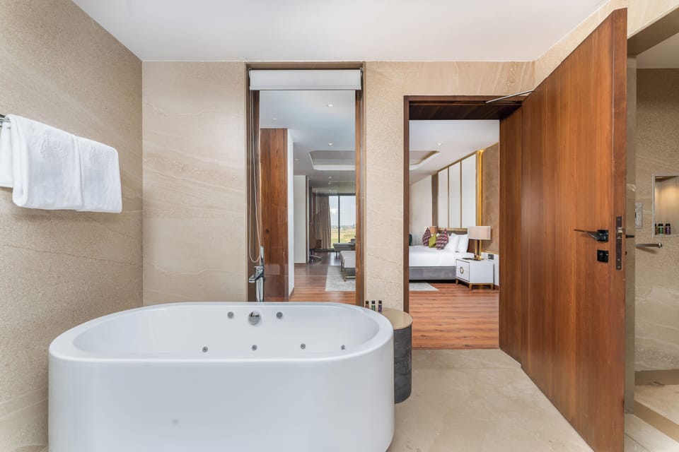 Luxury Suite | Bathroom | Rainfall showerhead, free toiletries, hair dryer, bathrobes