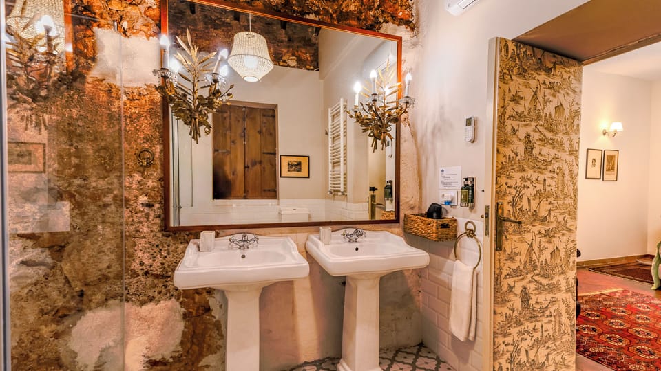 Superior Quadruple Room | Bathroom | Shower, rainfall showerhead, hair dryer, bathrobes