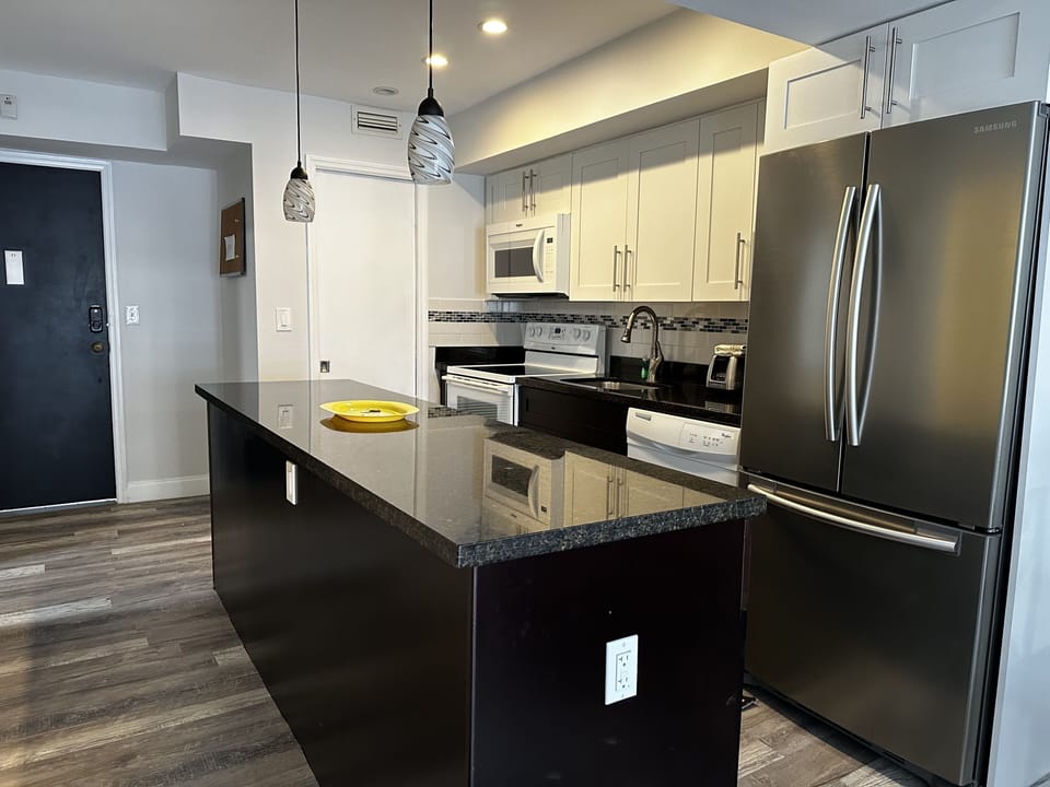 Family Apartment | Private kitchen | Full-size fridge, microwave, oven, coffee/tea maker