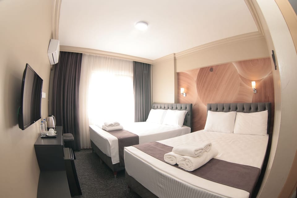 Egyptian cotton sheets, premium bedding, minibar, desk