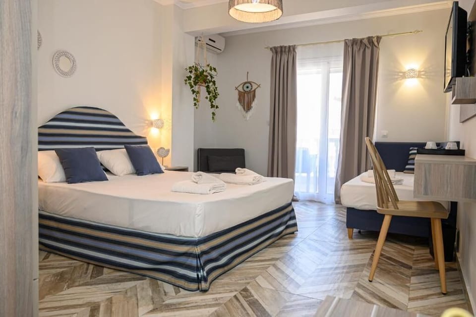 Superior Triple Room | Beach/ocean view