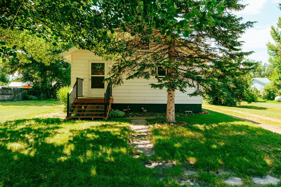 A peaceful setting surrounded by greenery, offering a quiet start and end to each day.