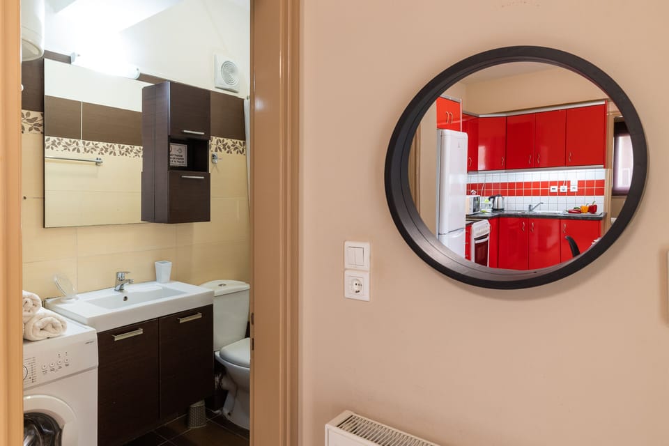 Full bathroom with a bathtub.