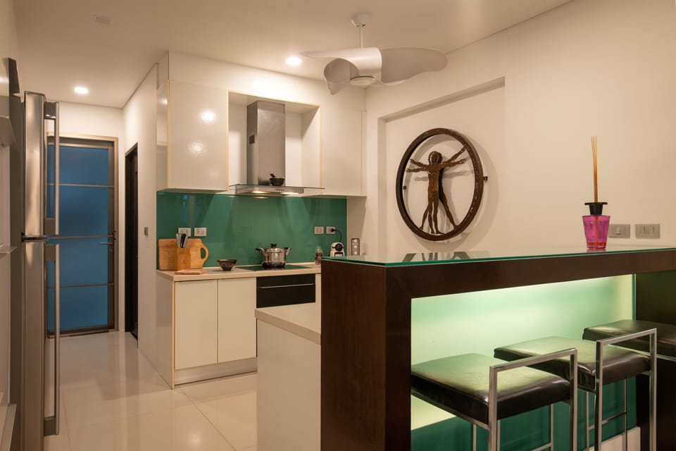 Exclusive Villa | Private kitchen | Full-size fridge, microwave, oven, stovetop