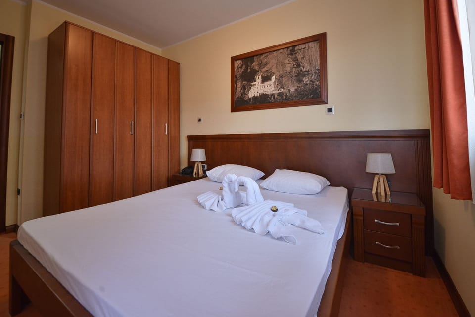 Premium bedding, memory foam beds, in-room safe, desk