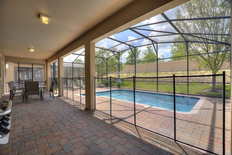 Screened Pool Area with Safety Fence