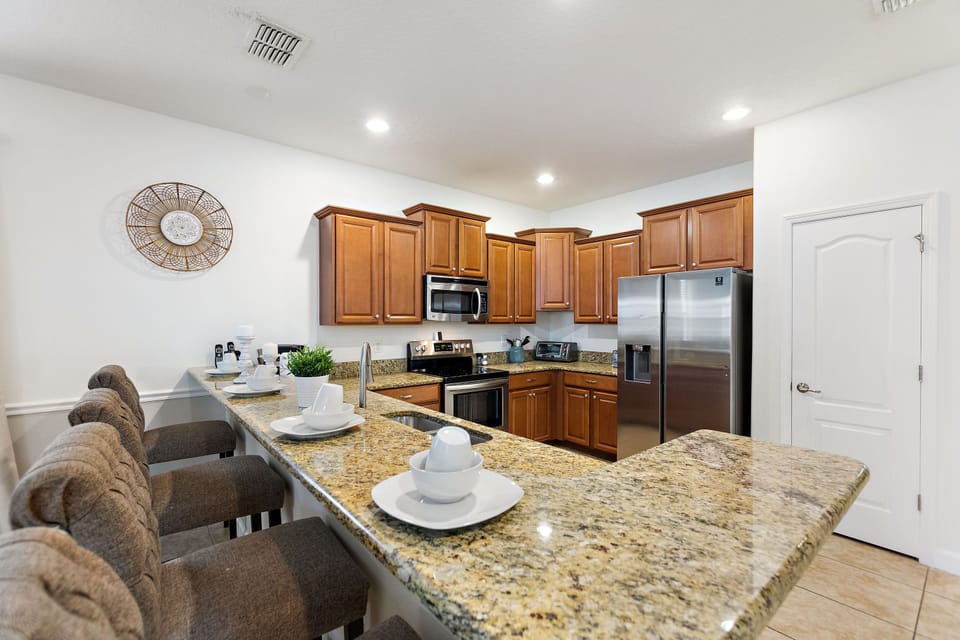Spacious Kitchen with Breakfast Bar