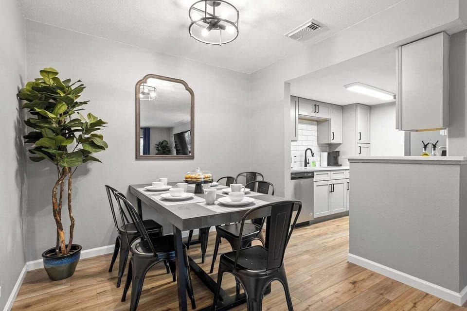 Dining space overlooking kitchen and living areas