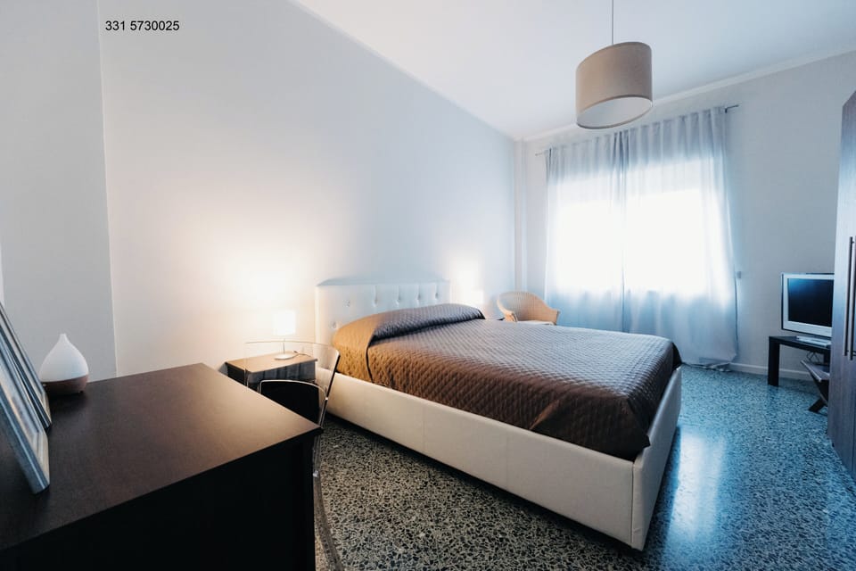 Premium bedding, down comforters, desk, laptop workspace