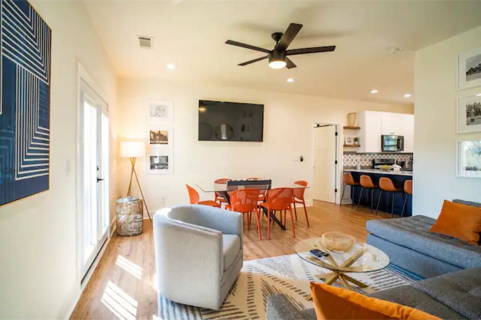 Modern dining room seats 6. Extra dining space for 4  in the kitchen.