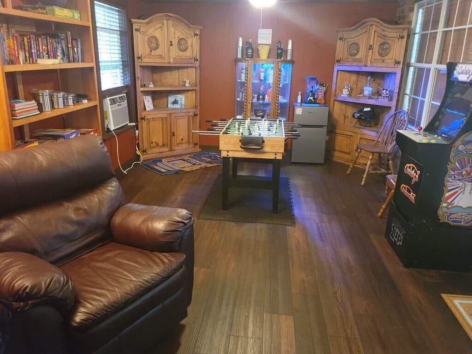 	Fun game room with foosball, arcade games, and family entertainment.