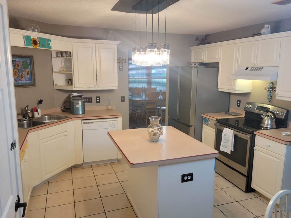 Bright, clean kitchen fully stocked with everything you need
