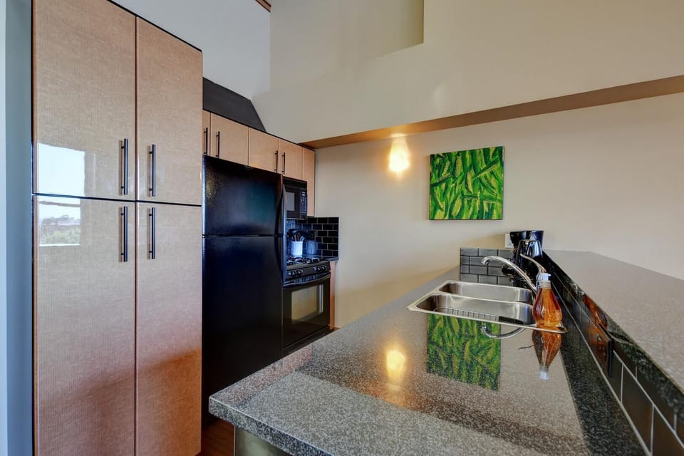 Channel your inner chef! This fully equipped kitchen features full-size appliances and ample counter space.