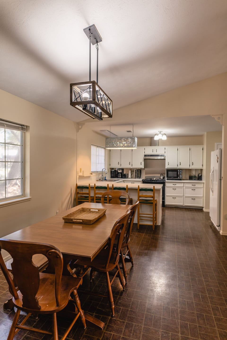 View of kitchen from dining table