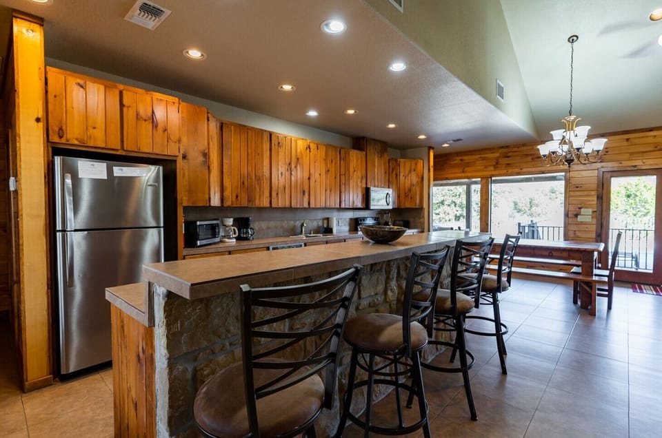 Kitchen view + bar seating