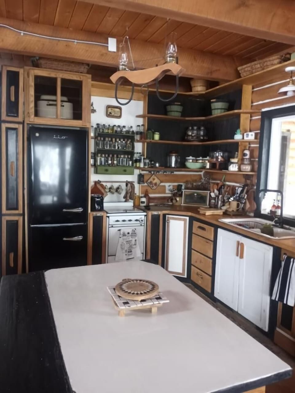 Our charming kitchen is equipped with everything you need to cook up a feast.