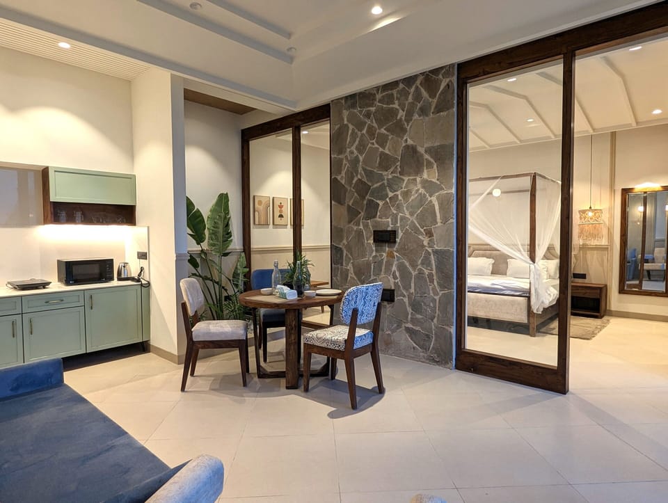 Presidential Studio Suite | Living area | Flat-screen TV, Netflix, Hulu, smart speakers