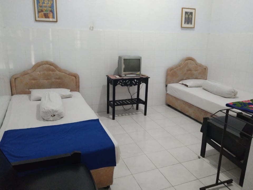 Deluxe Double Room | Desk, bed sheets