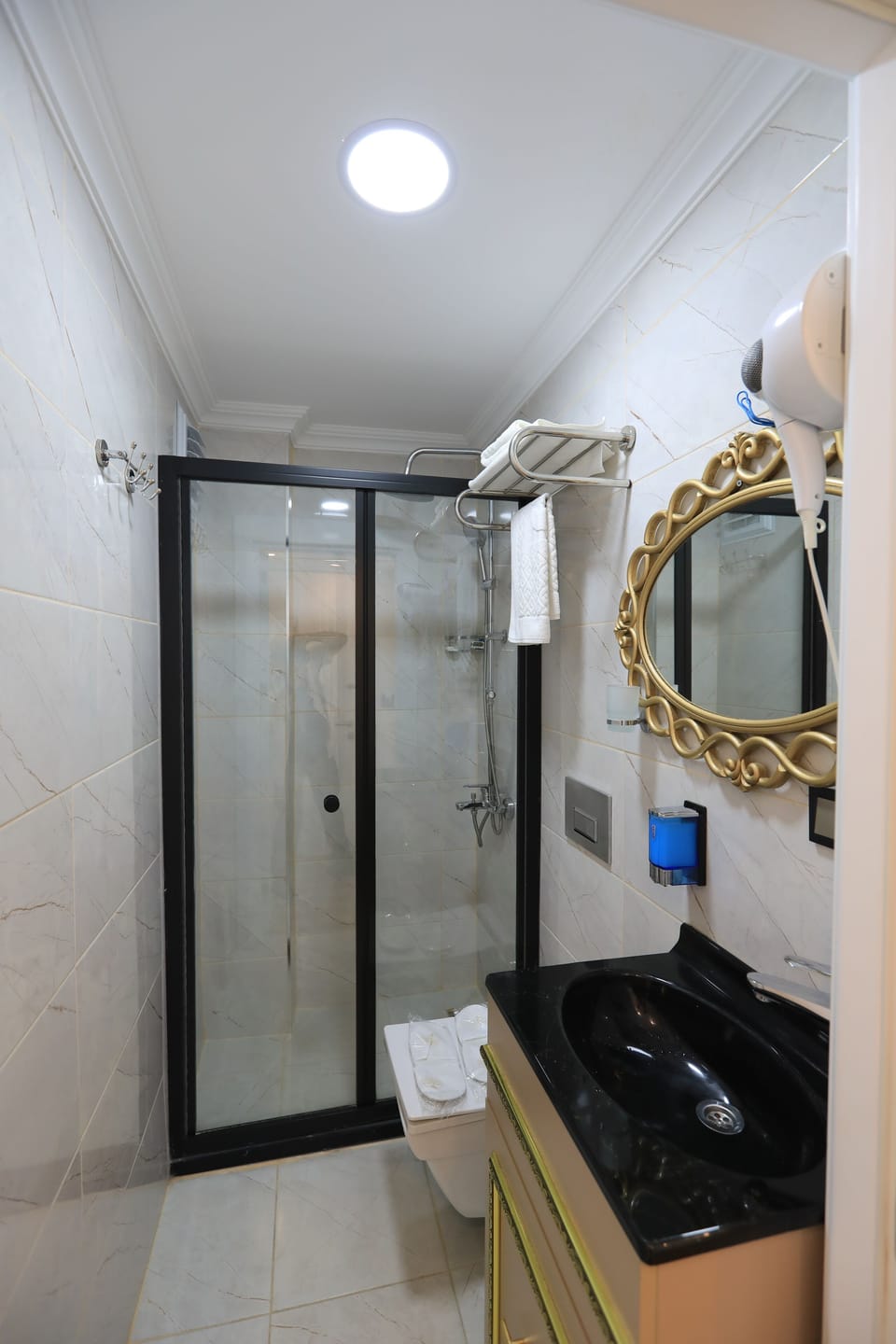 Shower, rainfall showerhead, hair dryer, slippers