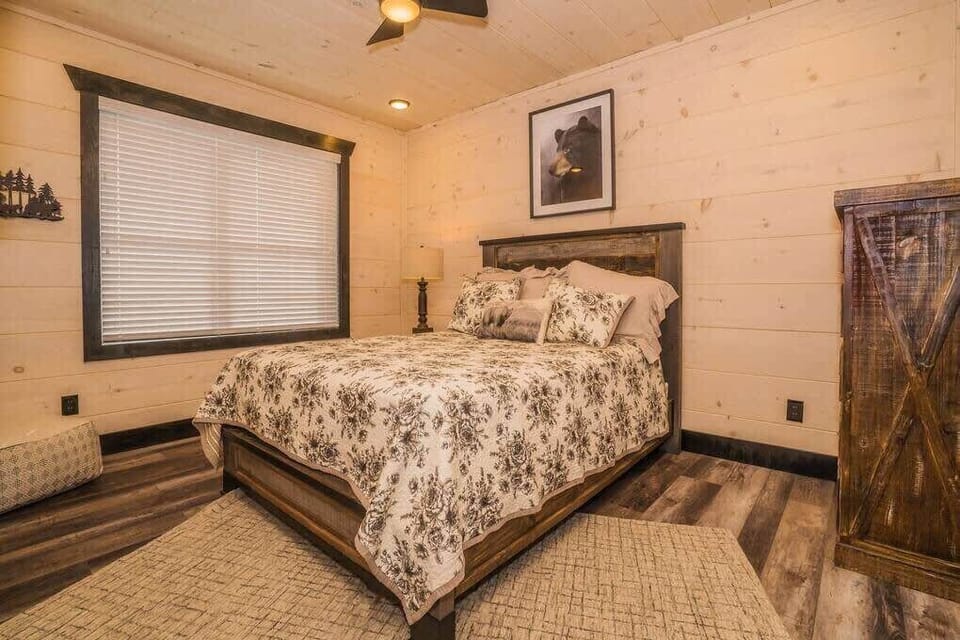 Main floor bedroom, Queen Size Bed with 55" Smart TV with multiple streaming apps.  