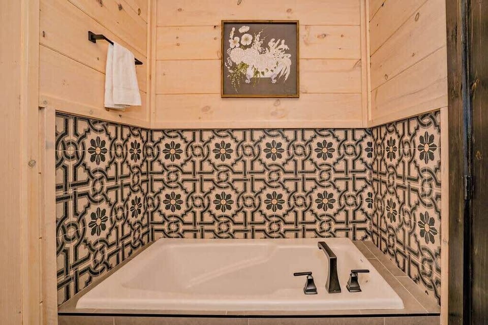 Custom tiled bathtub in master bath