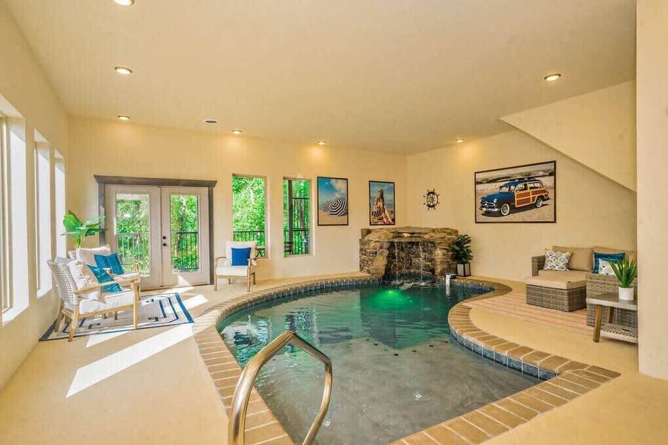 Indoor heated pool with toddler ledge and waterfall
