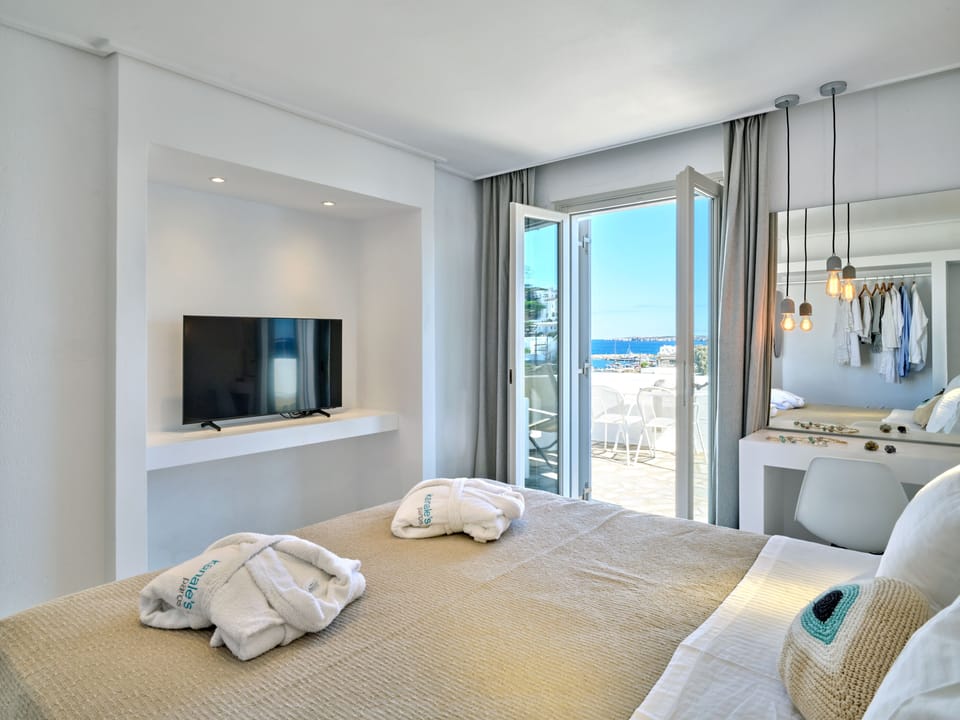 Junior Suite, 1 Bedroom, Balcony, Sea View | Premium bedding, in-room safe, iron/ironing board, free WiFi