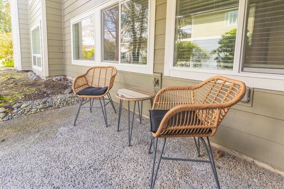 The living area extends to your own private patio, providing a serene retreat to unwind with a good book or savor a cup of coffee.