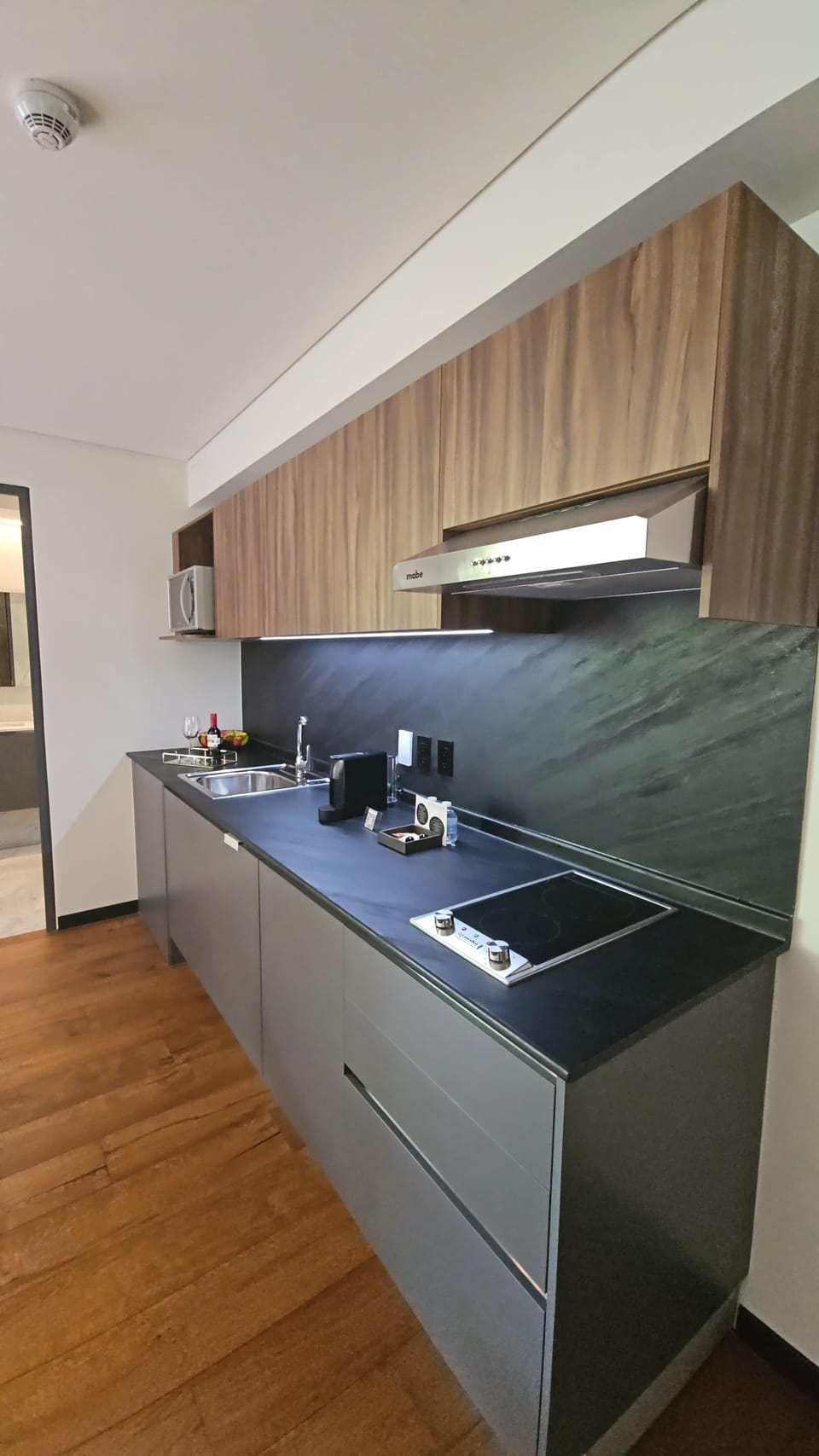 Suite, 1 Queen Bed, Balcony | Private kitchen | Mini-fridge, microwave, espresso maker, cookware/dishes/utensils