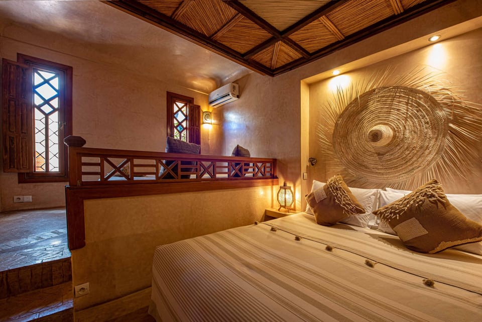 Suite Le Ciel | Premium bedding, down comforters, in-room safe, individually decorated