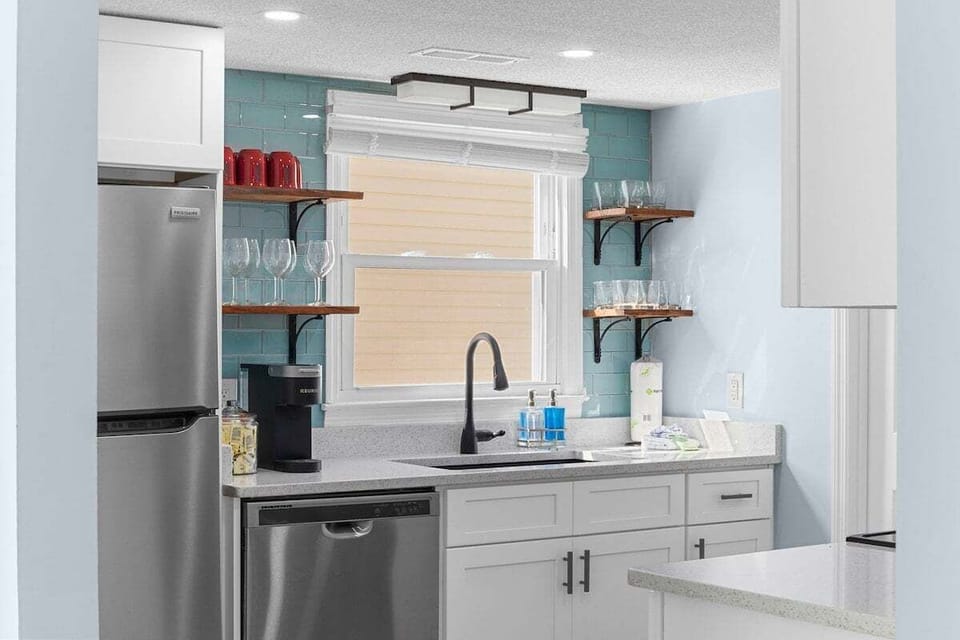 Whether you're washing dishes or preparing ingredients, our sink offers a functional space that's enhanced by the beauty of the outdoors