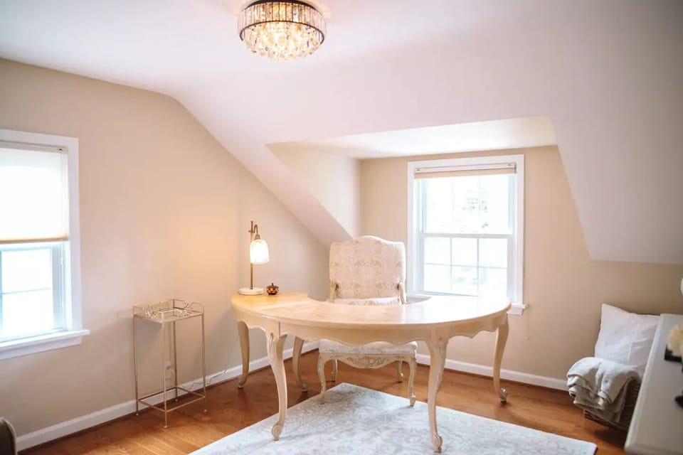 This room has a desk and a pull out sofa (twin bed). 
