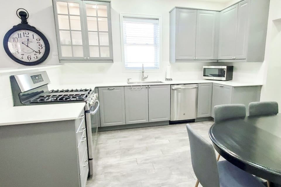Open kitchen with dining table.