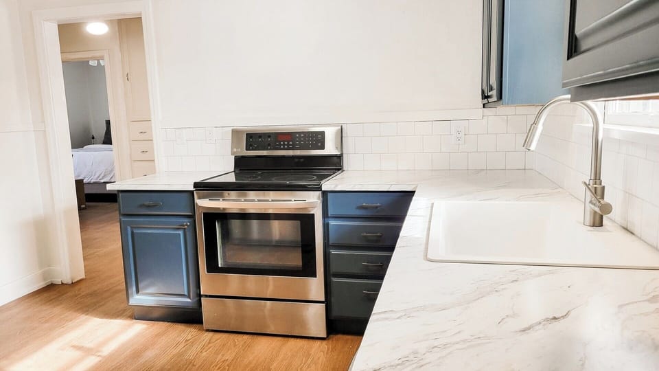 Fully stocked kitchen with all the things you need to cook with.