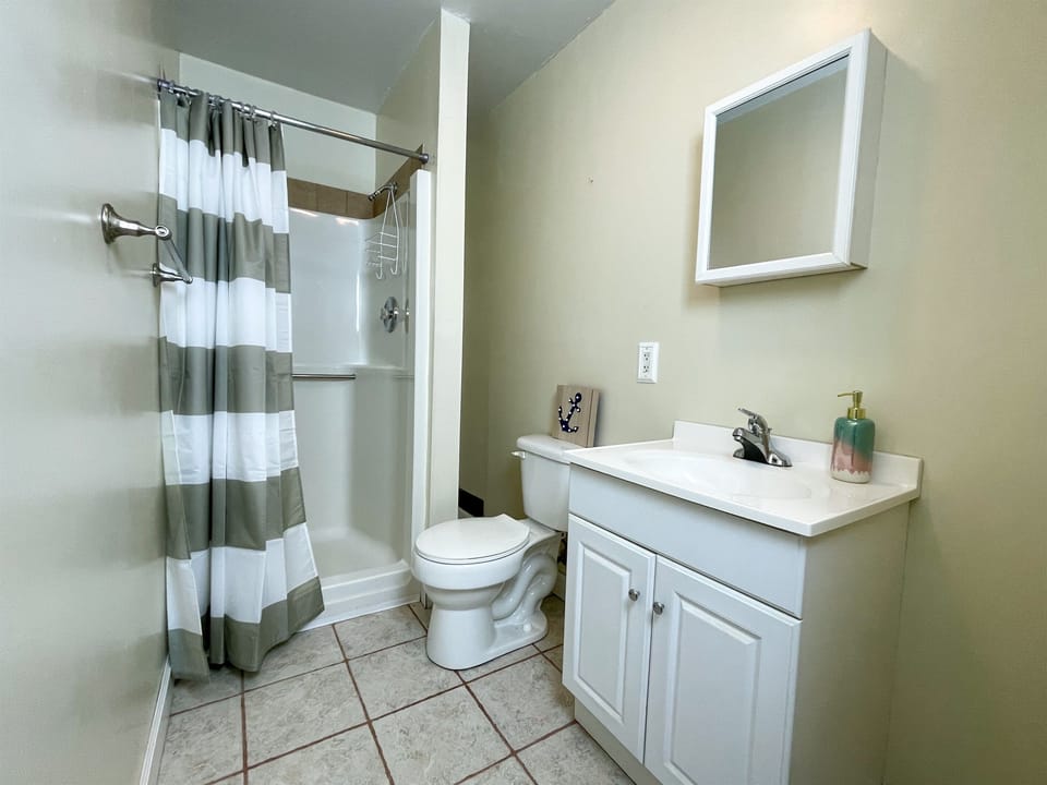 The basement has private bath with a full-size shower