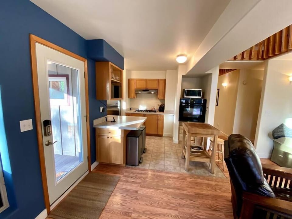 Access to kitchen, main living area, and dining area are all on the first floor upon entering.