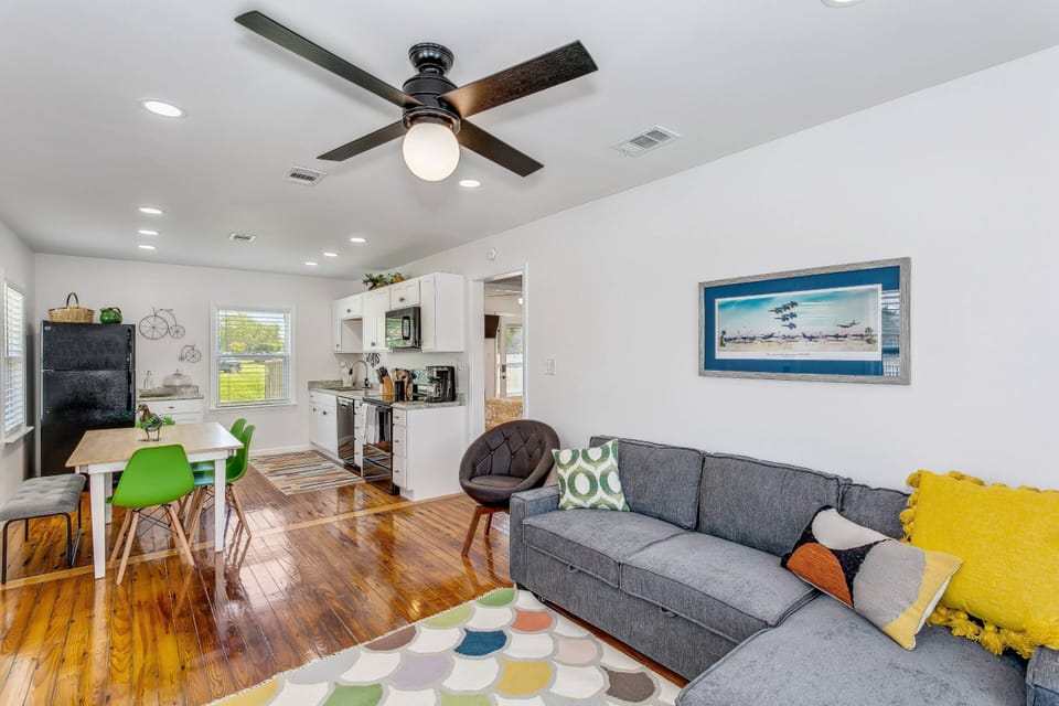 The living room is open to the dining area and kitchen