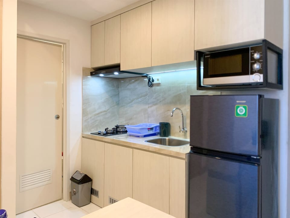 Apartment, 2 Bedrooms | Private kitchen | Full-size fridge, stovetop