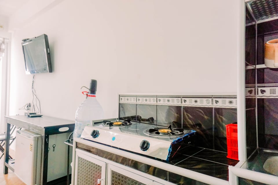 Apartment | Private kitchen | Full-size fridge, stovetop