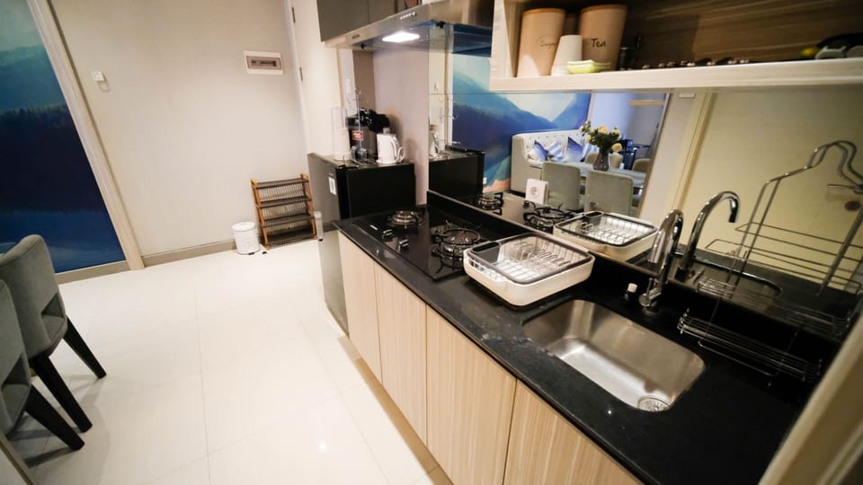 Apartment, 2 Bedrooms | Private kitchen | Full-size fridge, stovetop