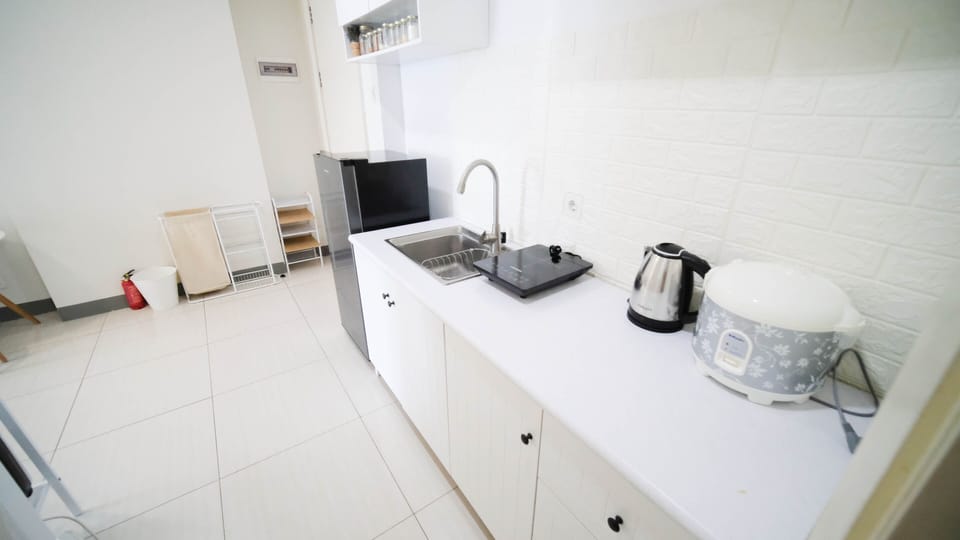 Apartment, 2 Bedrooms | Private kitchen | Full-size fridge, stovetop
