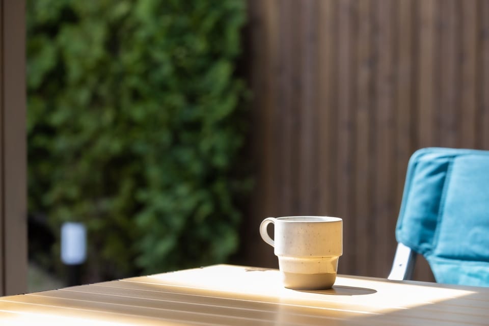 Flori Coffee time on the wooden deck