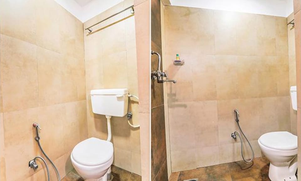 Deluxe Room | Bathroom | Shower, rainfall showerhead, free toiletries, towels