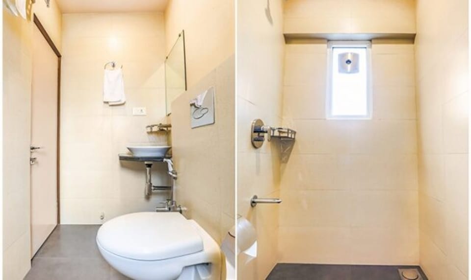 Deluxe Room | Bathroom | Shower, rainfall showerhead, free toiletries, towels