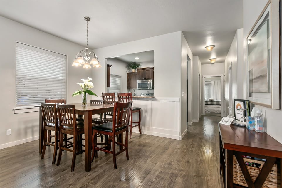 Home 1: Luxurious modern home with tasteful dining area off the upgraded galley kitchen.