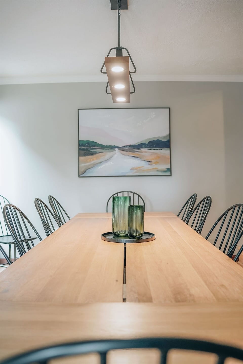 Gather in the heart of the home! With a dining table that has seating for 12, it's a space where everyone can come together for meals, playing games, or sharing stories about their day. 