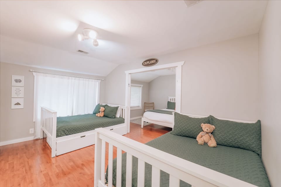 What could be more fun than the "kid camp" bedroom? This fun-filled room features two double beds with twin trundles, perfect for little adventurers. A Pack 'N Play is conveniently available for your use. 