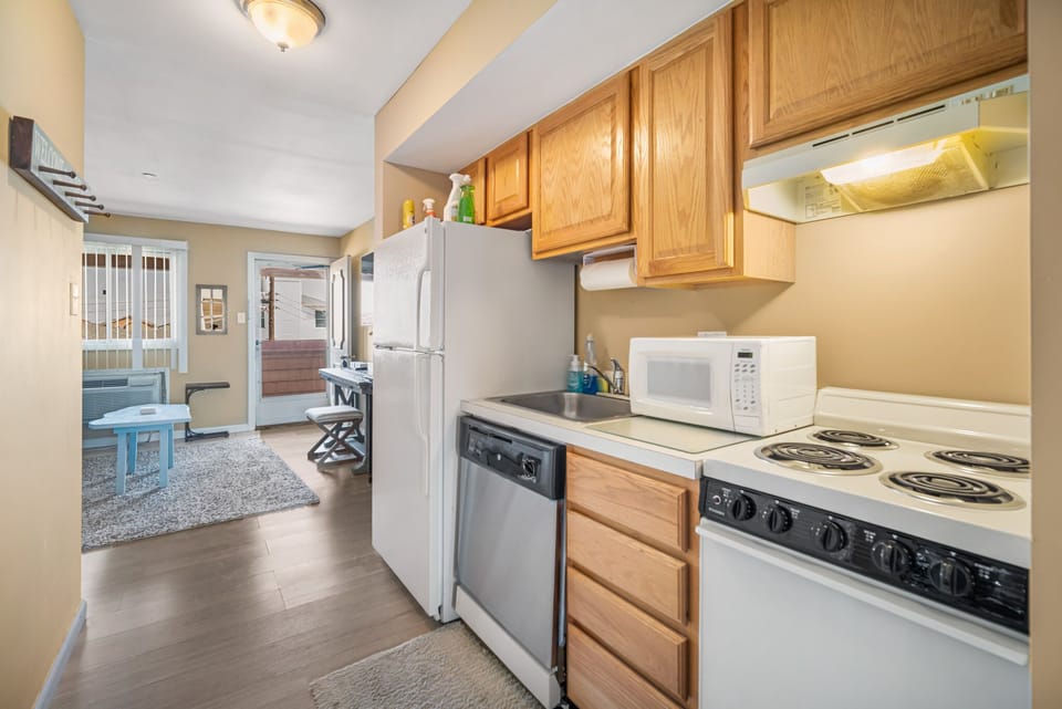 Full Stocked Kitchen includes Dishwasher.  Washer/Dryer is in closet in  Kitchen